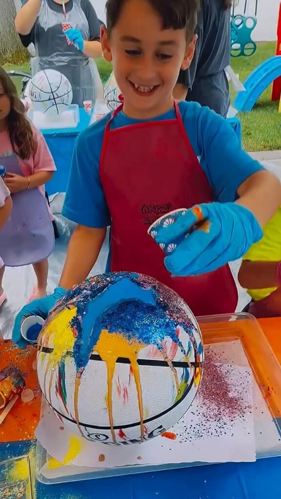 Artzi Events – There’s a reason we keep bringing this one back. Basketball paint pouring is the perfect